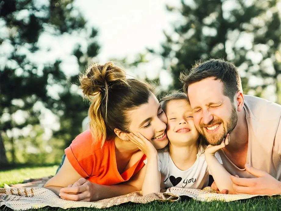Family enjoying healthy smiles after preventative dental care in Waskom, Texas
